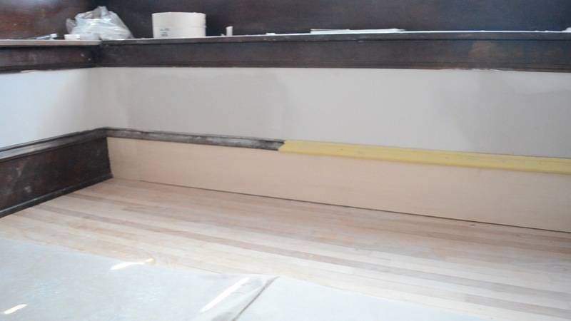 An unfinished baseboard in a country.