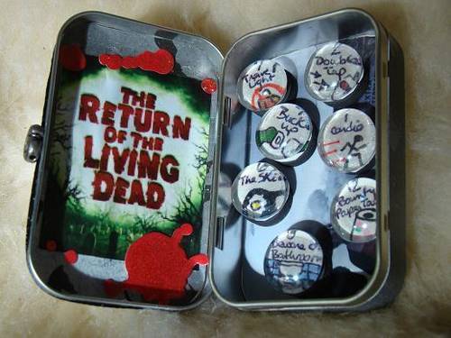 A lunch box the a "Return of the Living Dead" design on the inside.