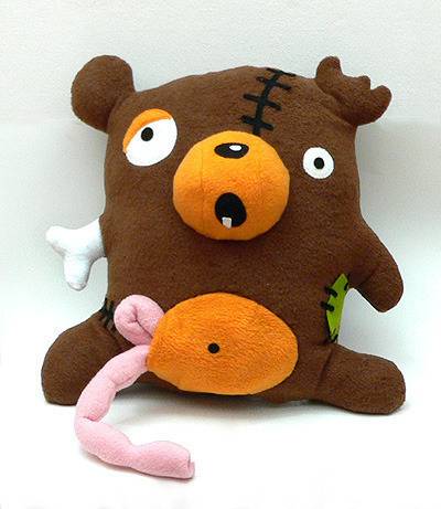 A stuffed animal looks like it is dead.