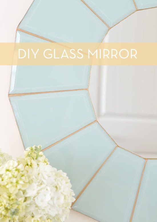 A light colored blue and white DIY mirror.