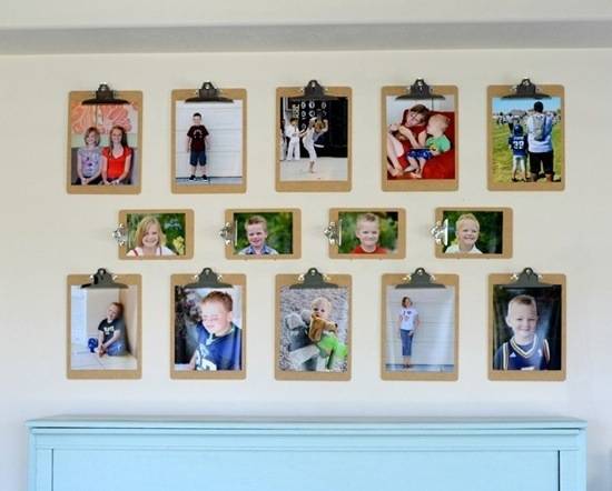 Several stylized pictures in frames on a wall.
