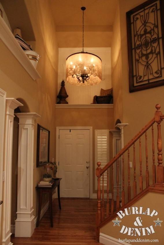 Barrel shade light on ceiling brighten the house.