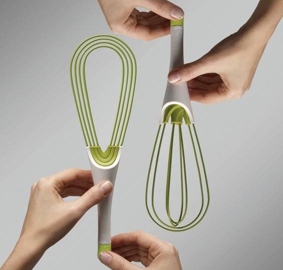 "Hand blender with plastic handle."