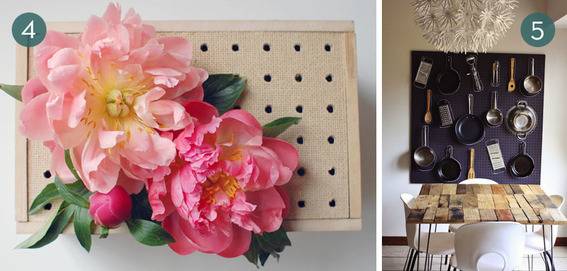 Two hanging pegboards, one with flowers and one with kitchen utensils.