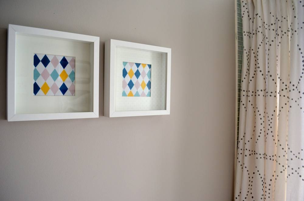 /tow colorful diamond shape pattern painting frames on wall.