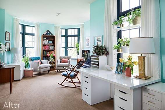 Chairs and desk in an eggshell blue living room.
