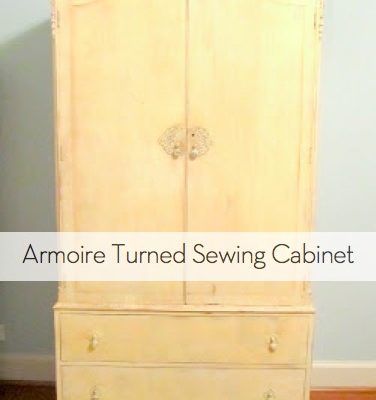 A light wood chest sits on a wooden floor.