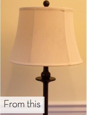 A floor lamp has a classic off white lamp shade.