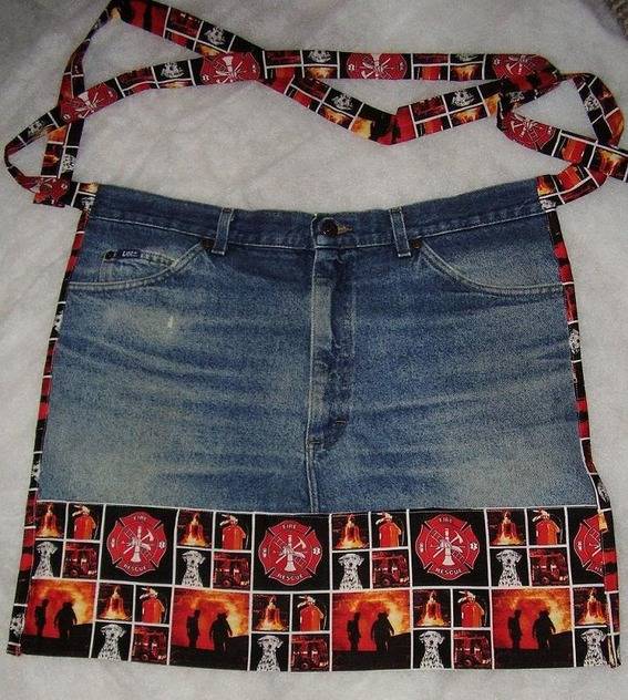 A apron made of the front of a pair of jeans and pictures of orange backgrounds on the bottom.