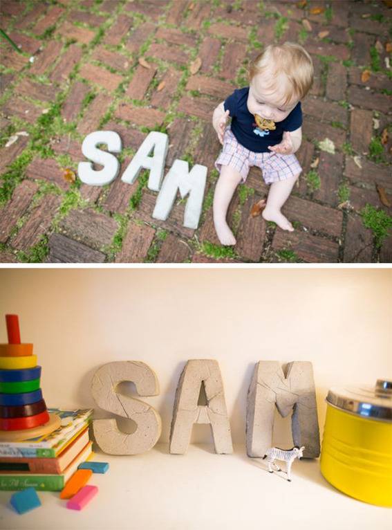 The name Sam is spelled out in letters on the ground.
