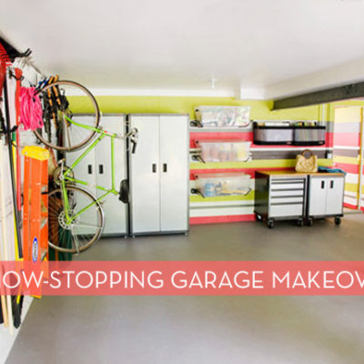 A garage with a bike and other items mounted on the walls.
