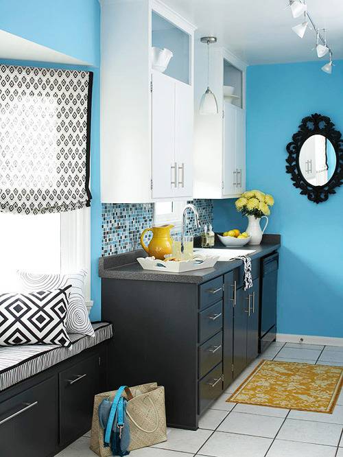 Blue color washbasin with cabinet.