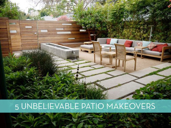 A patio with chairs and sofas surrounded by greenery.