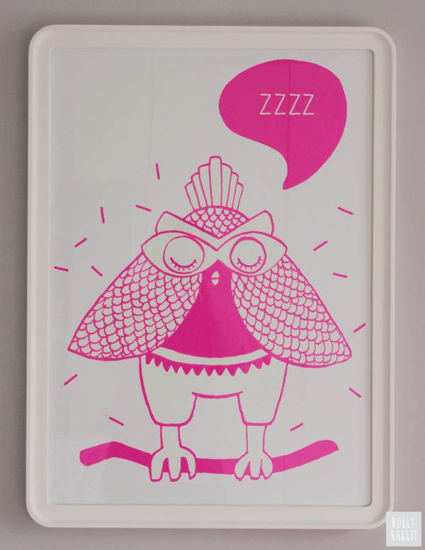 A pink owl drawing standing on a pink branch with the caption, zzzz.