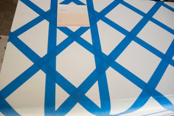 A tablecloth with blue line designs.