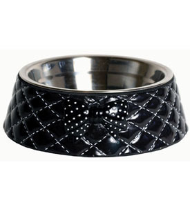 A black pet food bowl has a silver metal interior.