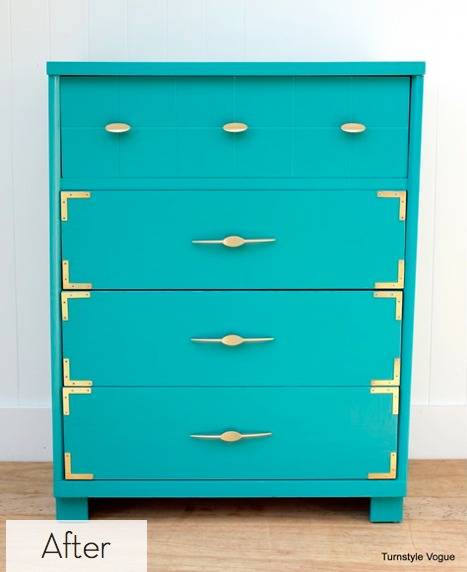 A blue dresser with four drawers and yellow trim.