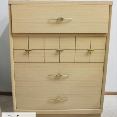 A wooden dresser with no paint or varnish.