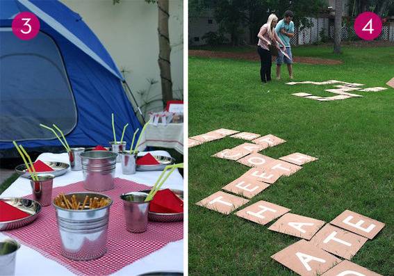 A blue tent with a blanket and buckets in front next to a grass scene with scrabble blocks on it.