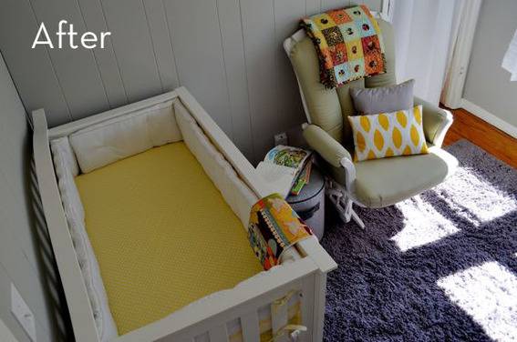 Nursery with a crib that has a yellow mattress, and a rocking chair.