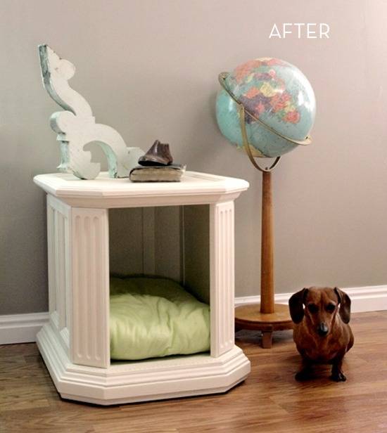 Dog standing by a dog bed that looks like a nightstand.