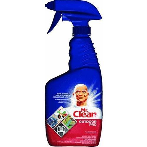 Bottle of spray cleaner with picture of man on surface.
