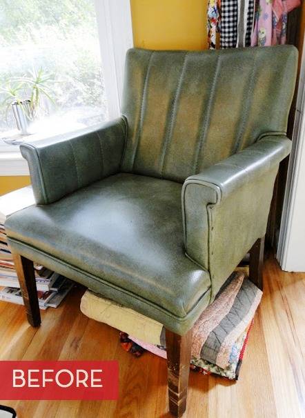 Weathered leather chair with a blanket in a living room.
