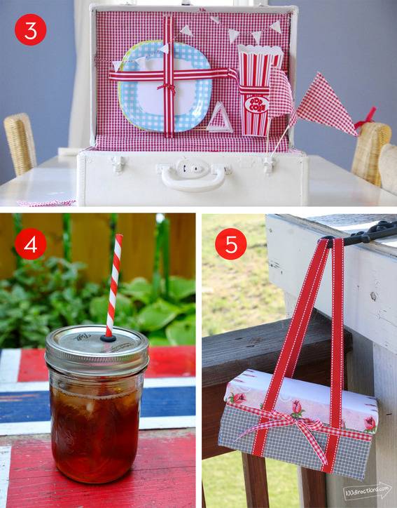 Plate and cups inside a picnic basket next to mason jar with lid and straw.