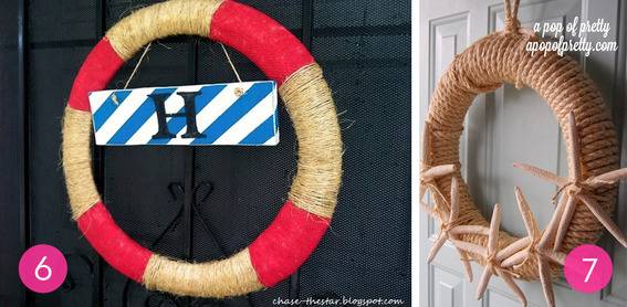 A tan and red wreath with a blue and white board hanging from it with A black H on it and a rope wreath with rope starts around the bottom.