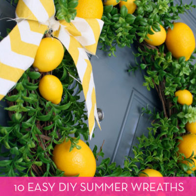 A wreath on the door made out of lemons and bows.