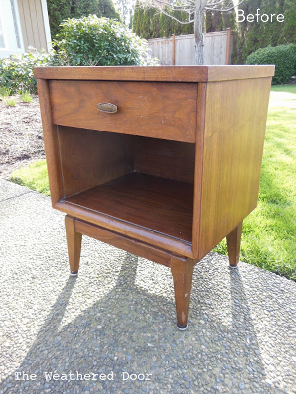 A wooden nightstand sits outside.