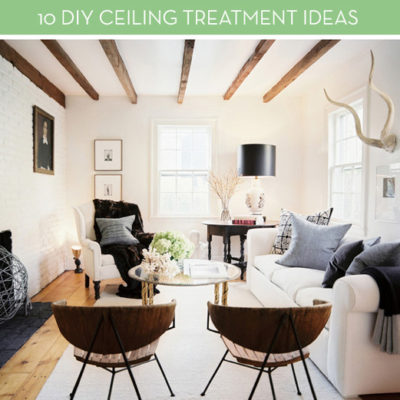 White living room farm house style with wooden chairs and a white sofa