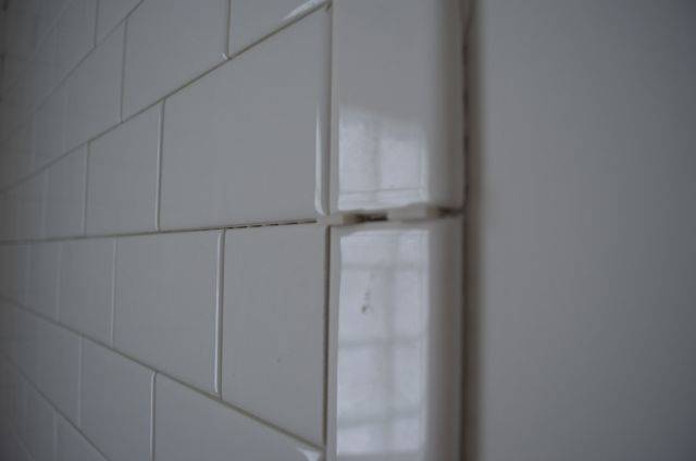A white tile wall, with nothing else.