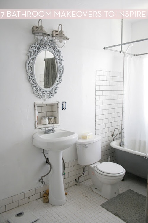 A mirror above a white sink and toilet in a bathroom with a tub.
