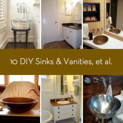 Metal washbasin converted to a sink in a bathroom.
