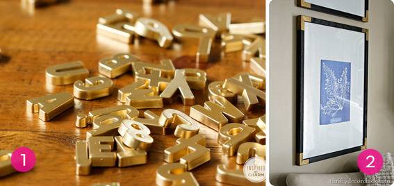 Group of gold metallic letters next to a picture frame.