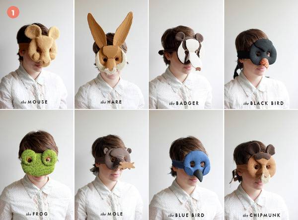 Animal masks with various designs on people's faces.