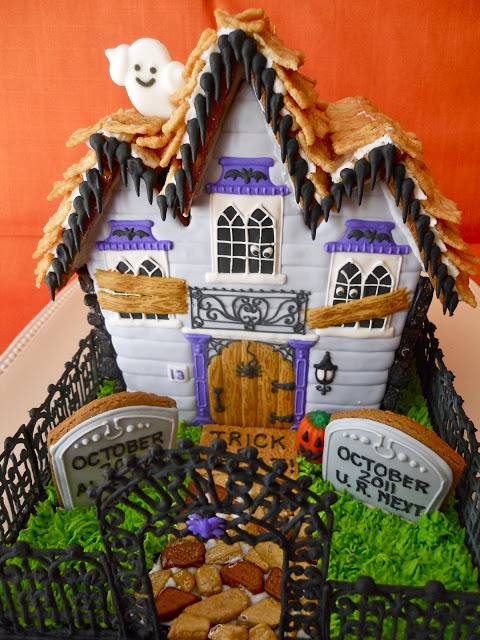 This gingerbread house has a Halloween theme.