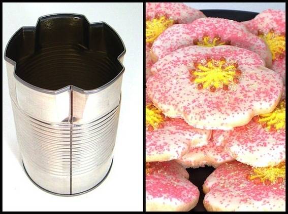 Soup cans that have been made into presses for cookie dough.