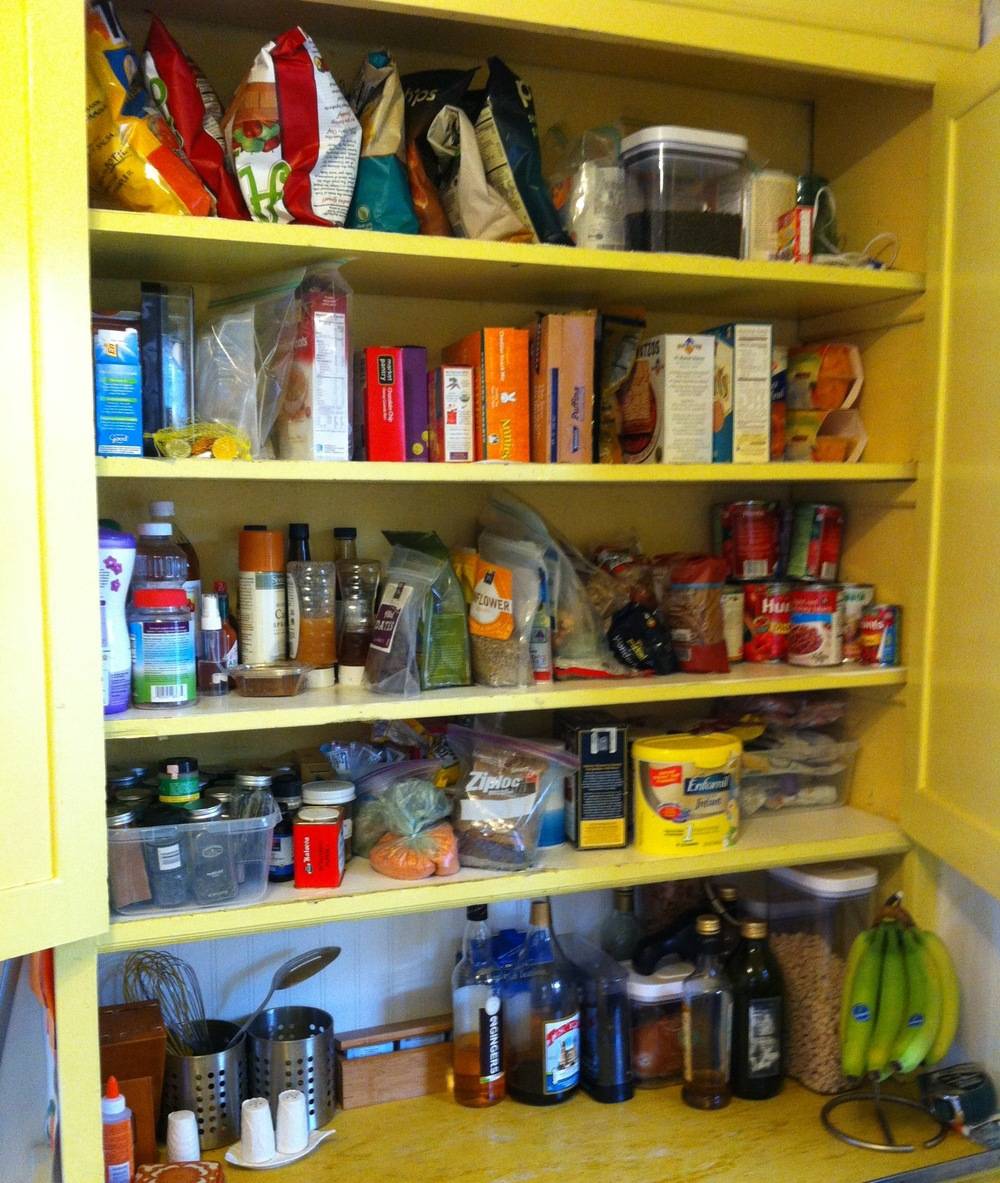 Items are sitting on a bright yellow shelf.