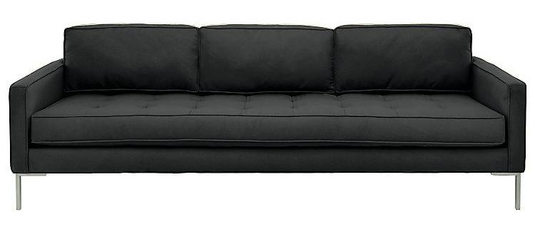 A long black couch with silver legs.