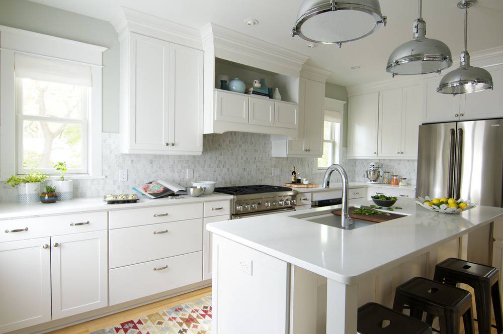All white, modern styled kitchen.