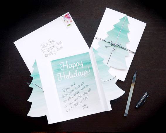 Handmade Christmas greeting cards tied with rope.