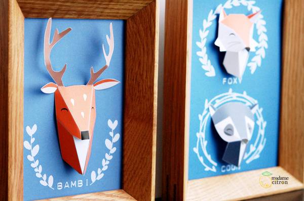 Animals are shown in frames with blue paper.
