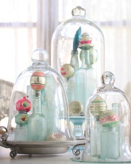 Glass jars in bell shape used for Christmas decoration.