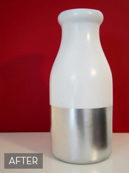 Milk bottle colored with white and silver paints to make vase.