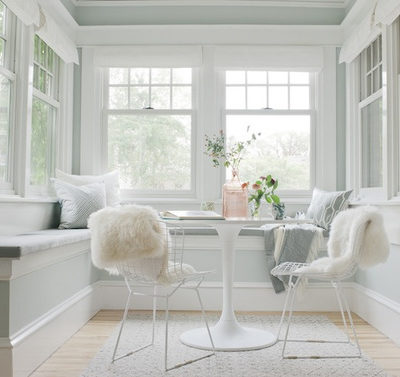 Our bright and airy sunroom styled by Emily Henderson