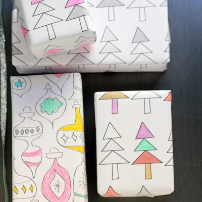 Three Christmas tree scribble, and one ornament scribble wrapping papers cover boxes