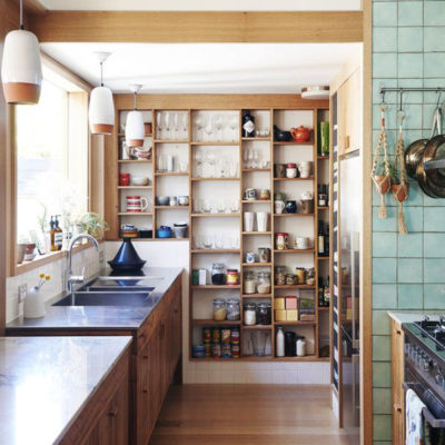 Kitchen items are organized in pantry.