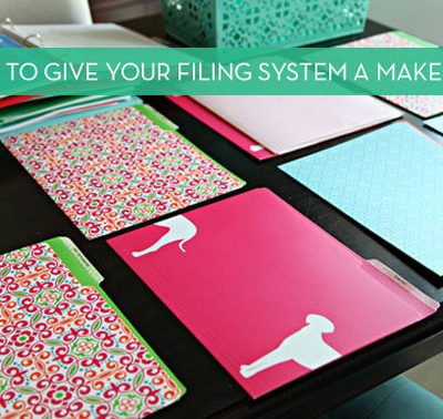 Colorful filing folders on top of a desk.